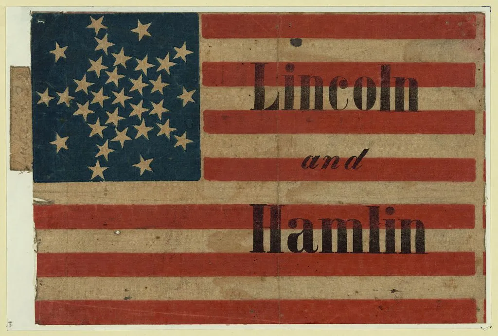 Small American flag campaign banner printed with the names Lincoln and Hamlin.