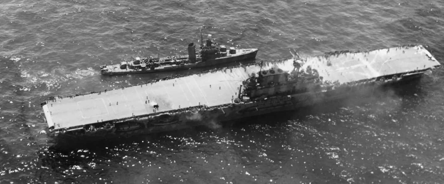 USS Russell alongside damaged USS Hornet as U.S. ships attempt to save the carrier during Santa Cruz.