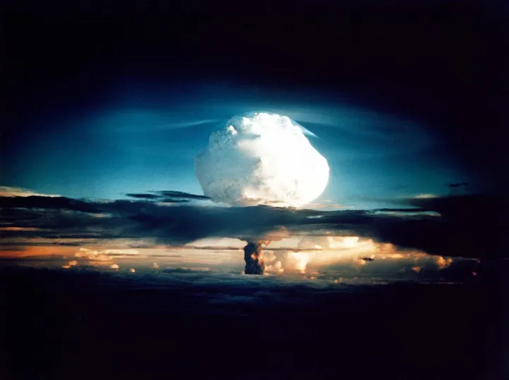 Color photograph of the Ivy Mike mushroom cloud over the ocean.