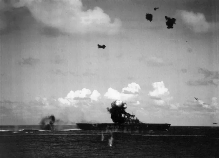 Japanese Aichi D3A dive bomber striking USS Hornet during the 1942 Santa Cruz naval battle.