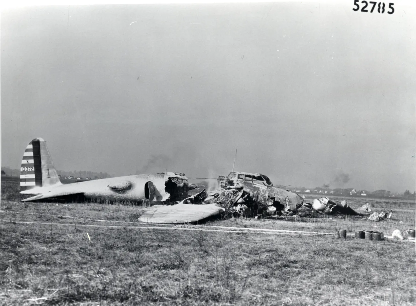 The burned remains of the Model 299 after the crash and fire.