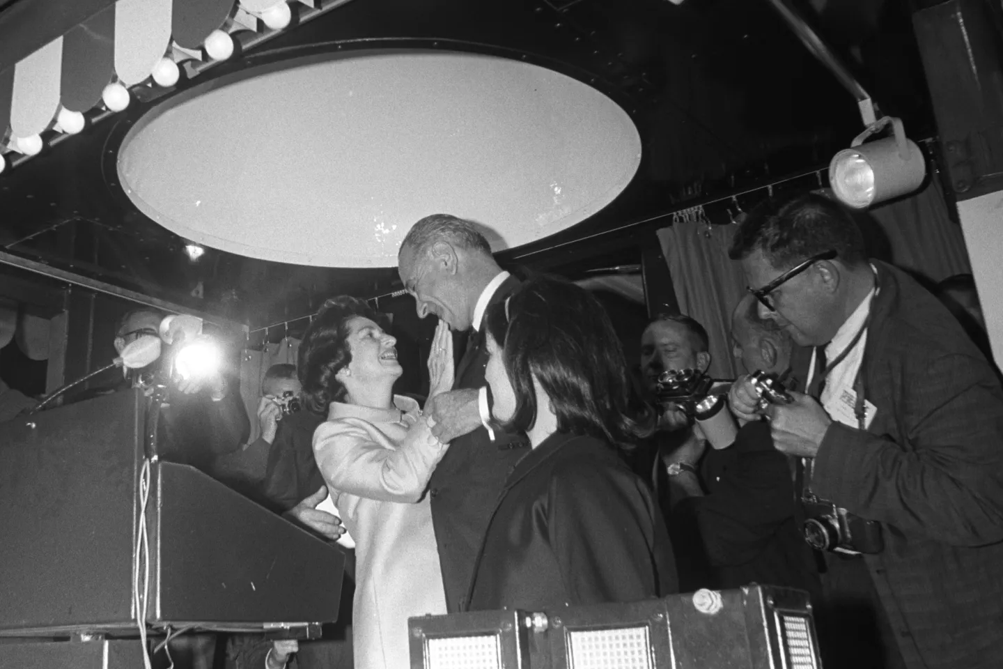 Lyndon and Lady Bird Johnson greet each other at the campaign train in New Orleans.
