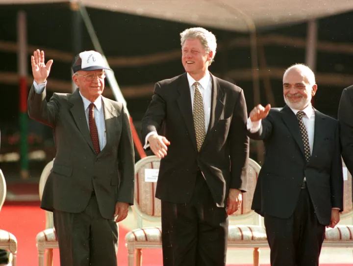 Bill Clinton, Yitzhak Rabin and King Hussein at the Israel–Jordan peace treaty ceremony on October 26, 1994.