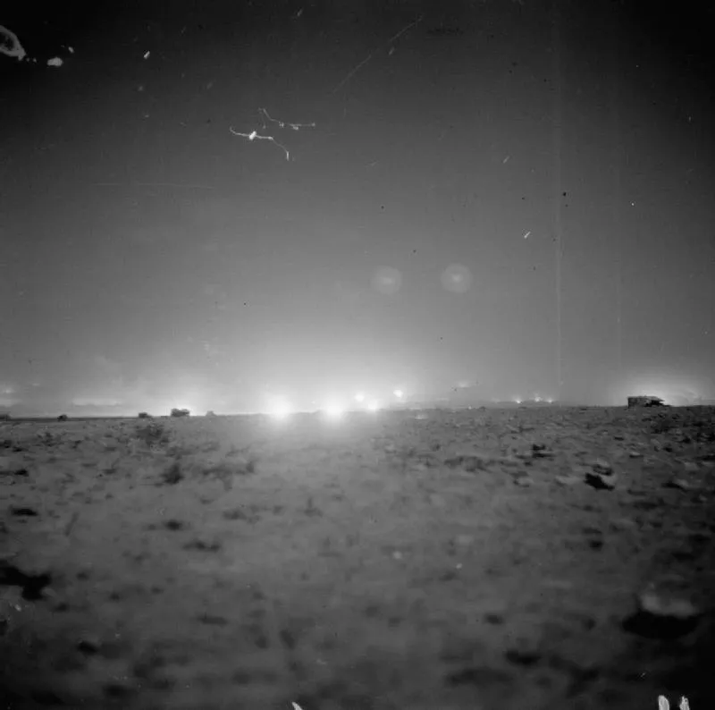 Nighttime British artillery barrage as the Second Battle of El Alamein opens on October 23, 1942