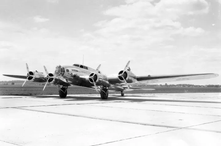 The Boeing Model 299 prototype sits on the ground.