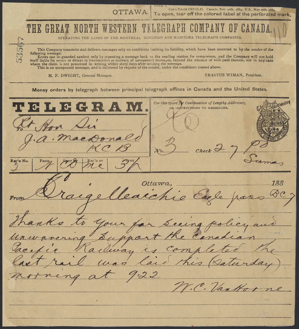 A handwritten telegram on a printed form announces the completion of the Canadian Pacific Railway.