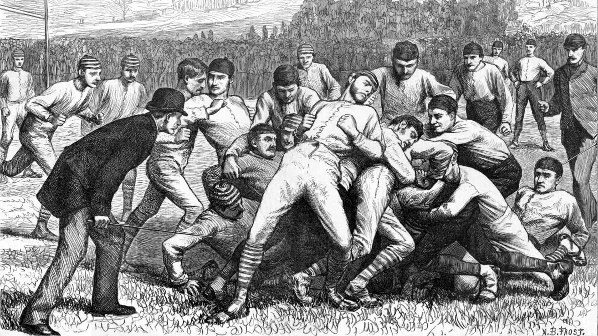Wood engraving of players struggling around a ball during the 1879 Princeton–Yale game.