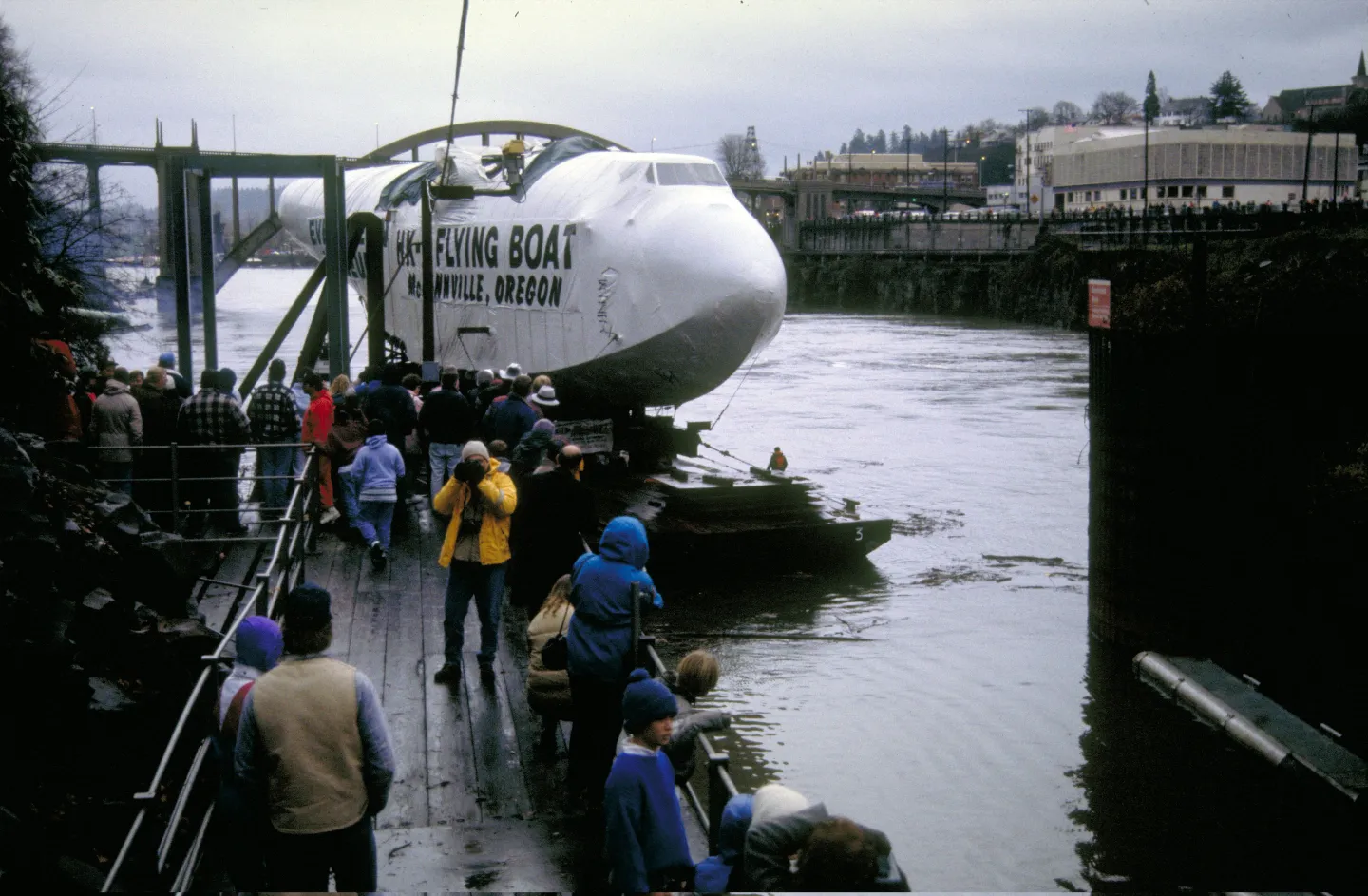 Hercules fuselage passes through the Willamette Falls Locks in 1992.