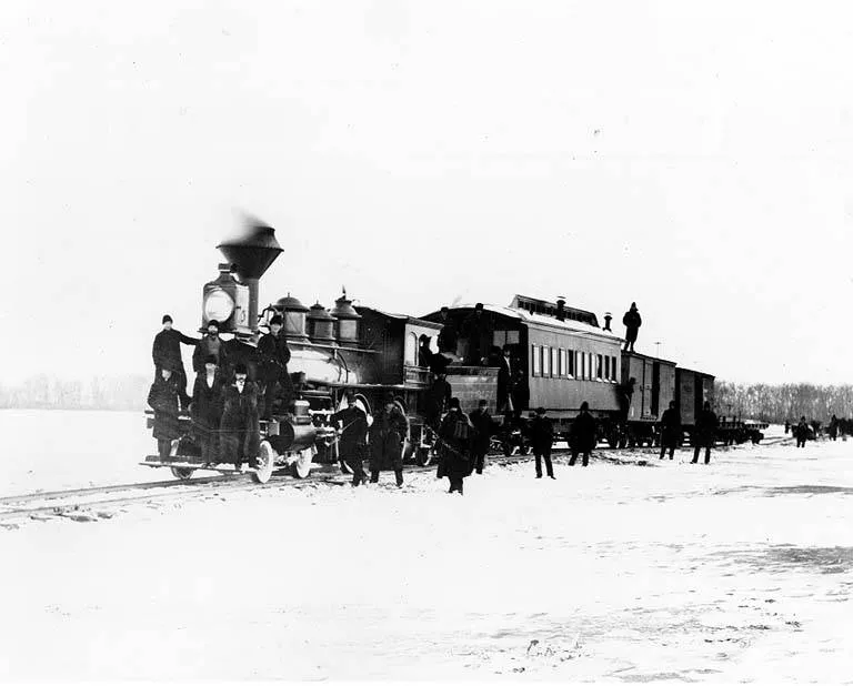 Northern Pacific train on temporary tracks laid across the frozen Missouri River.