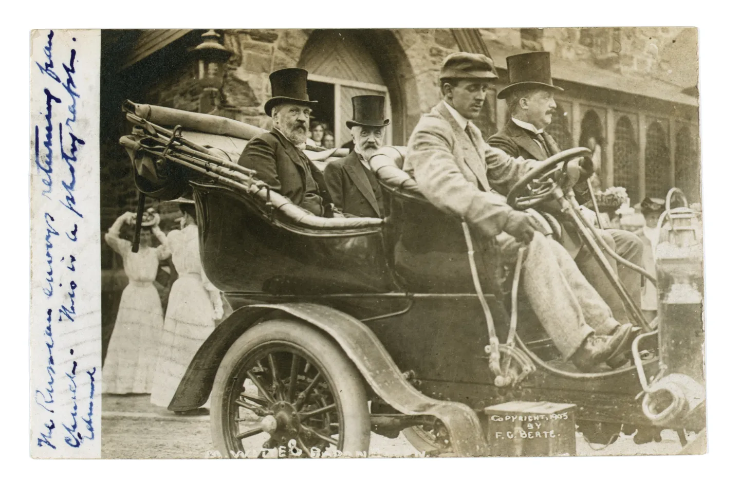 Witte and Rosen seated in an open automobile.