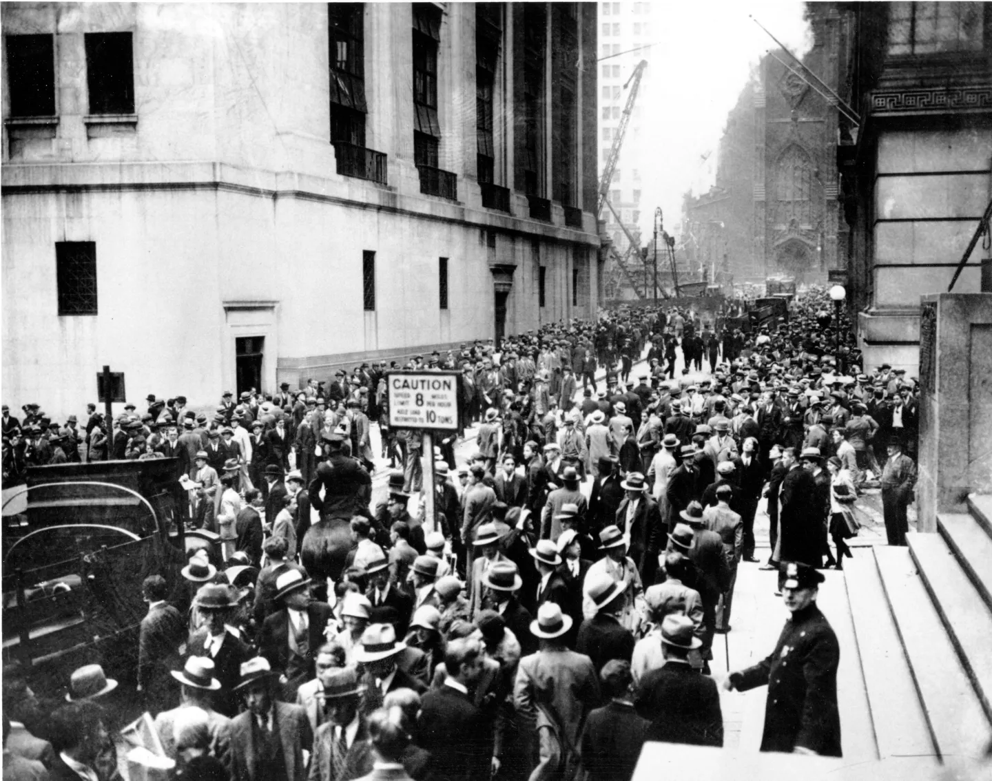 A dense crowd outside the New York Stock Exchange during the October 1929 crash.