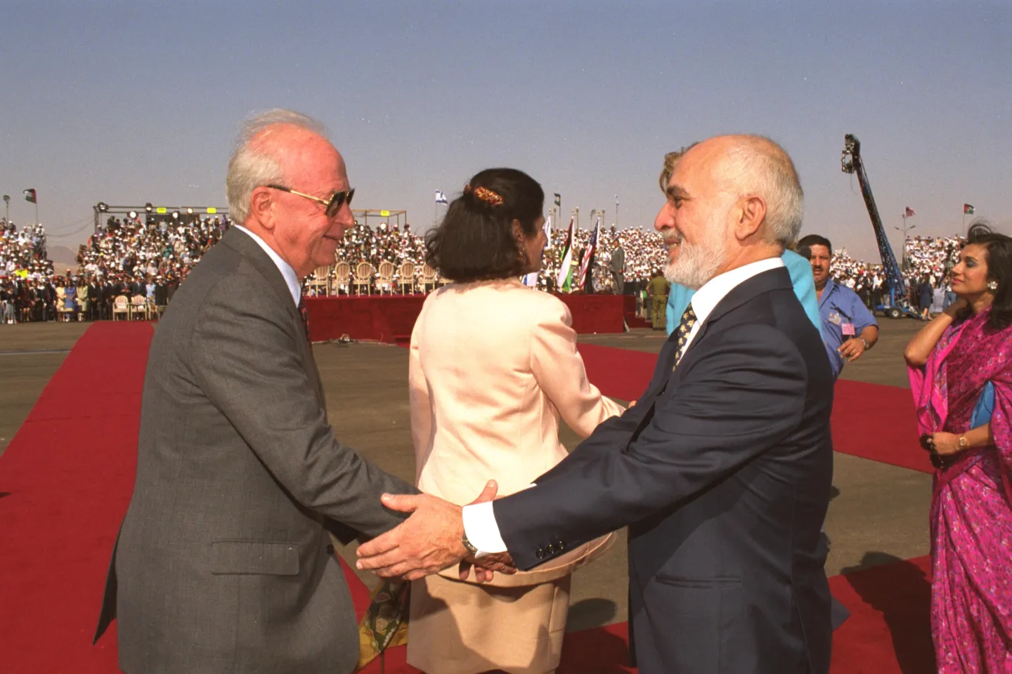 Yitzhak Rabin and King Hussein greeting each other at the Israel–Jordan border crossing in 1994.