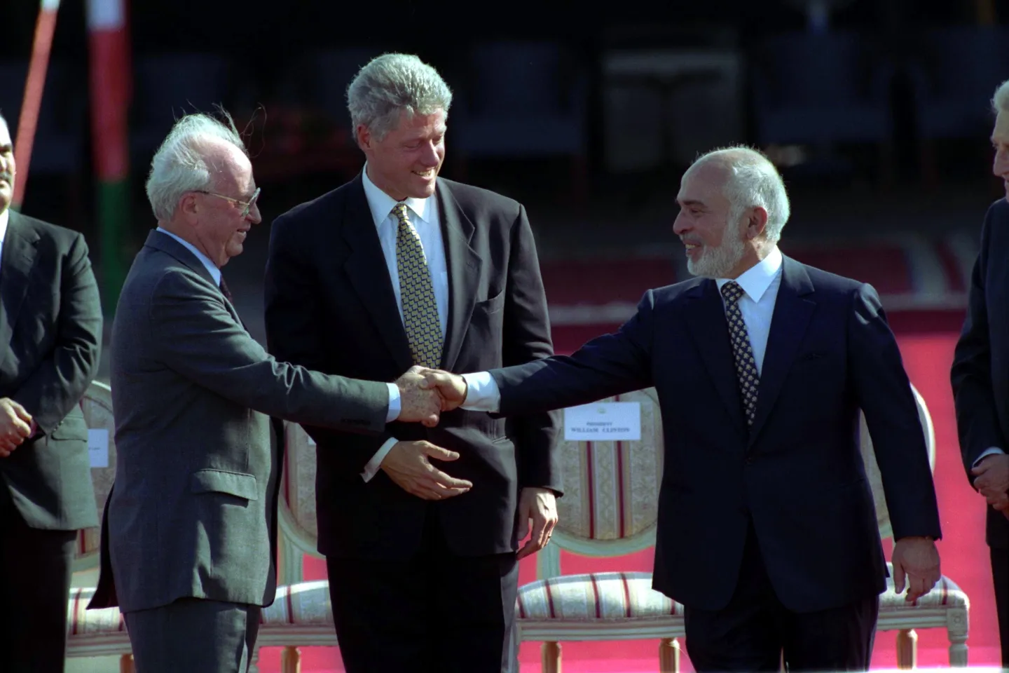 Israeli Prime Minister Yitzhak Rabin shaking hands with King Hussein of Jordan after the 1994 treaty signing.