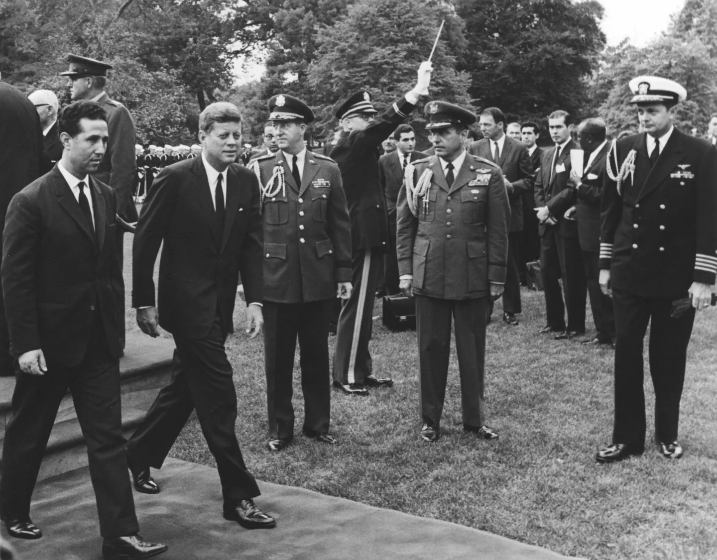Ahmed Ben Bella and John F. Kennedy at the White House arrival ceremony.