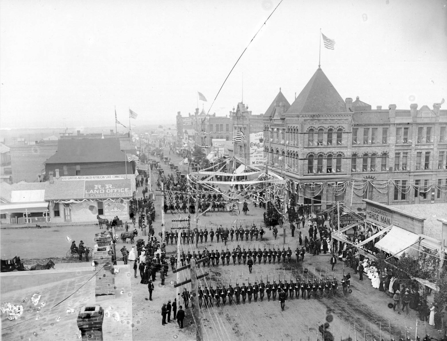 An 1889 constitutional-convention parade at Main and Fourth streets in Bismarck.